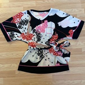 Floral blouse with elastic waistband and tie belt